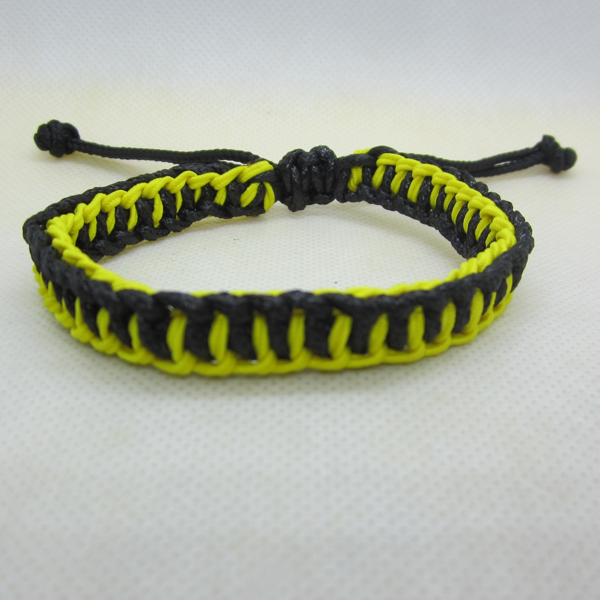 Bracelet macrame two colors (black, yellow, double)